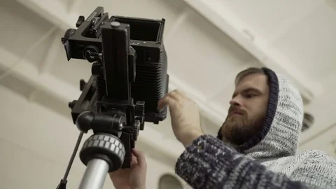 Man demount retro camera close-up Video stock 72104427