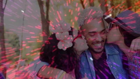 Man in denim jacket getting kissed, sparking laughing hug, pink overlay pulsing Stock Footage 333734567