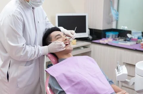 A man with dental care activity Stock Photos