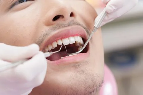 A man with dental care activity Stock Photos