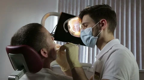 Man at a dentist examination Stock Footage 61852214