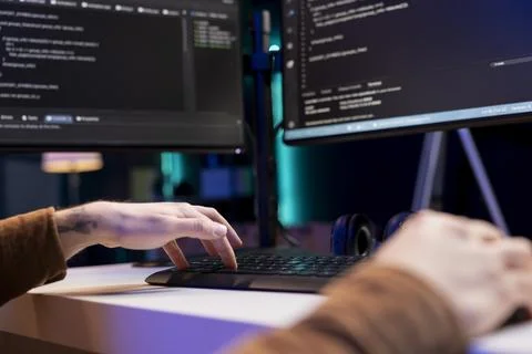 Man deploying programming script increasing data security, close up shot 스톡 사진