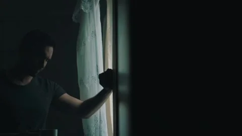 Man depressed in old soviet apartment Stock Footage 131397792