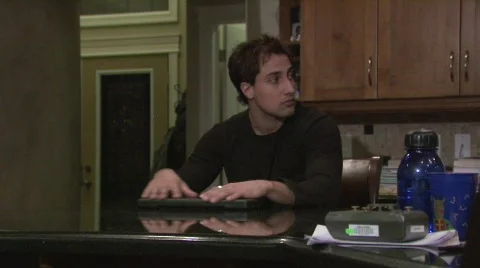 Man is depressed while sitting and thinking Stock Footage 479703