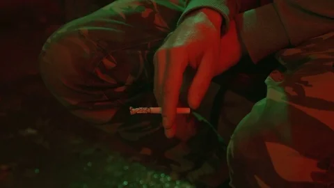 A man in a depression under the influence of various drugs. Stock Footage 83088129