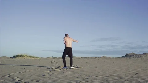 Man in desert Stock Footage 77454839