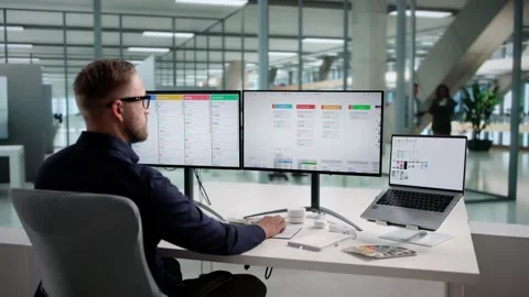 Man Designing UX/UI Software On Computer Stock Footage 321155736