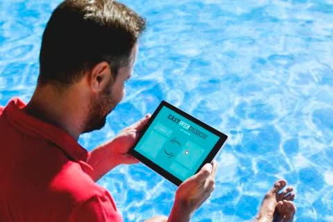 Man designing web page with an electronic tablet Stock Photos