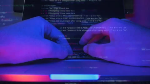 Man is designing web software. Coding on screen. Web developer hands are typing Stock Footage 141698375