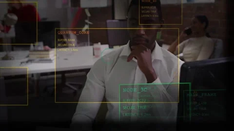 Man at desk responding to tech HUD readouts, raising hand to chin and analyzing Stock Footage 334114140
