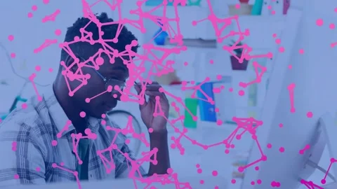Man at desk sparking dots on PC forming node mesh covering view while fixing Stock Footage 334034848