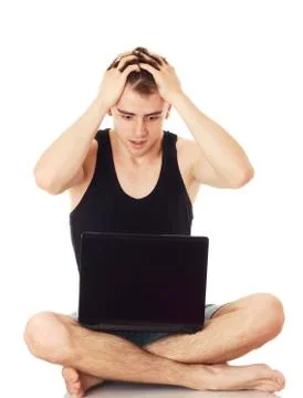 Man despairing with computer. Stock Photos