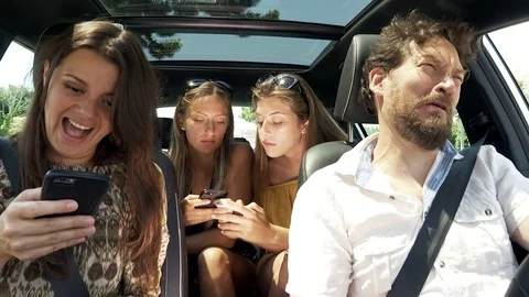 Man desperate about family not listening to him playing with cell phone in ca Stock Footage