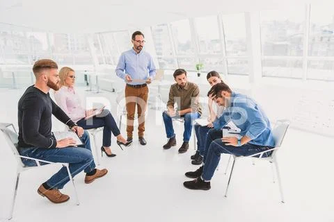 Man in desperation at psychological training Stock Photos
