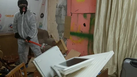 The man destroys an old computer by a sledgehammer Stock Footage 88299986