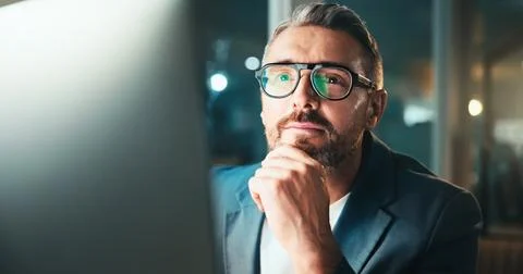 Man, developer and glasses on computer at night for programming website Stock Photos