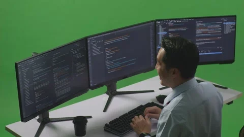 Man Developer Celebrating And Dancing While Write Code With Multiple Computer Stock Footage 249635140