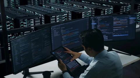 Man Developer Working With Tablet While Write Code In Data Center Stock Footage 270228558