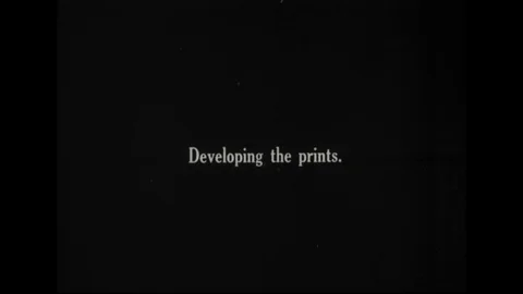 Man develops prints - 1918 動画素材 86474891