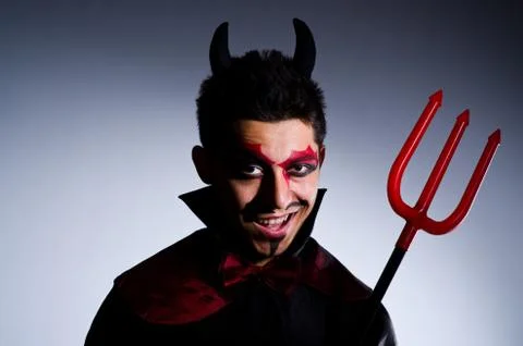 Man in devil costume in halloween concept 스톡 사진