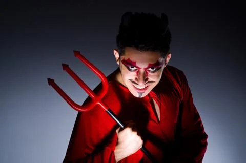 Man in devil costume in halloween concept 스톡 사진