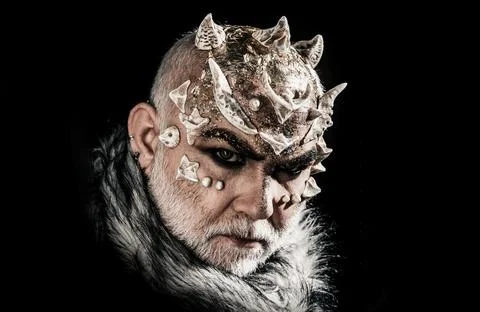 Man with devil horns. Mysterious man, horned devil demon. Mythical devil Stock Photos