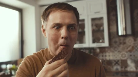 Man Devouring Cake Stock Footage 209954180