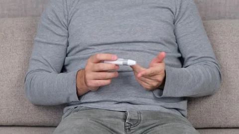 Man diabetes tool Stock Footage 295147860
