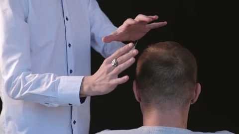 A man diagnoses a patient using the biofield of his hands Stock Footage 168300593