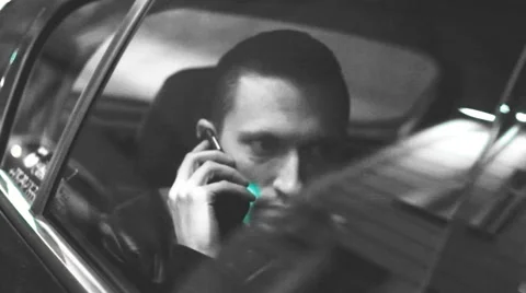 A man dials in the car Video stock 59952140