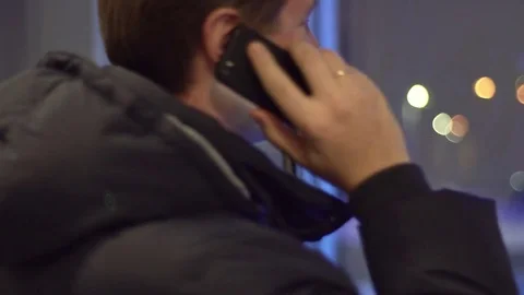 The man dials a number on a mobile phone. A very joyful conversation Stock Footage 72246500