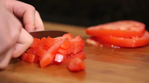 Man dicing tomatoes close up Stock Footage 61393909