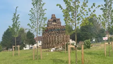 Man dies after falling from bonfire in Belfast Stock Footage 339298141
