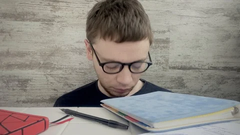 Man of difficulty to study and work Stock Footage 128981846