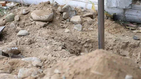 Man digging earth with a shovel Stock Footage 300908544