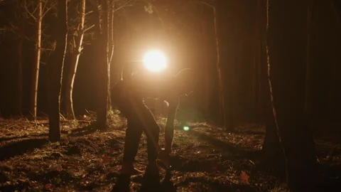 A Man Digging a Grave in the forest Vídeo Stock 259088241