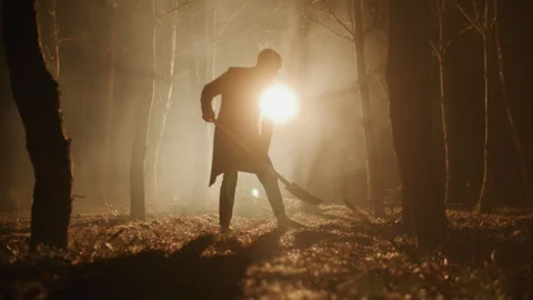 A Man Digging a Grave with a Shovel in the forest 스톡 동영상 259121799