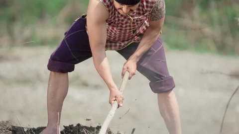 Man Digging Ground | Land Stock Footage 124744361