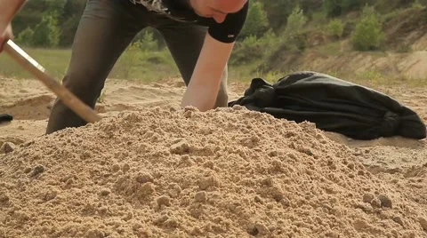  man digging a hole with a shovel. Close-up. Stock Footage 58148455