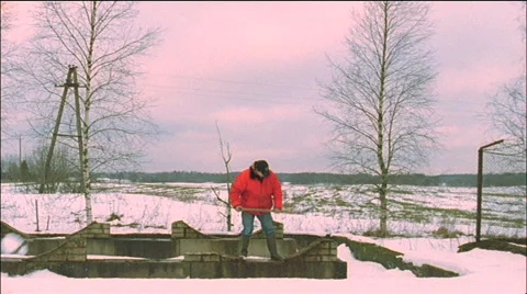 A man digging snow Stock Footage 2874783