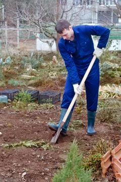 Man digging soil Stock Photos