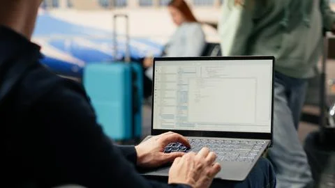 Man digital nomad, focused on programming, system development 스톡 사진