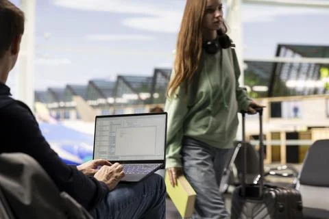 Man digital nomad, focused on programming, system development on laptop Stock Photos