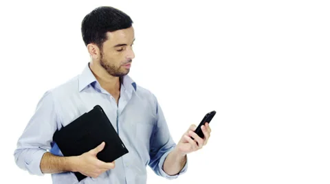 Man with digital tablet and cell phone technology on white background Stock Footage 32958031