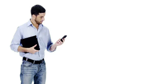Man with digital tablet and cell phone technology on white background Vídeos de archivo 32959083