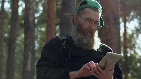Man with digital tablet outdoors. Stock Footage 81793537