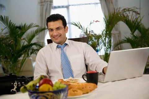 Man at the dining table Stock Photos