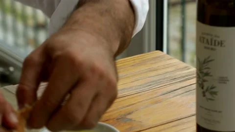 Man, dipping, bread, olive oil Stock Footage 166170423