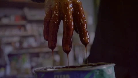 Man dipping hand in varnish Stock Footage 279774525