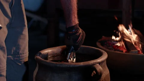 Man Dips Pipe Into Water 库存影片 158070518